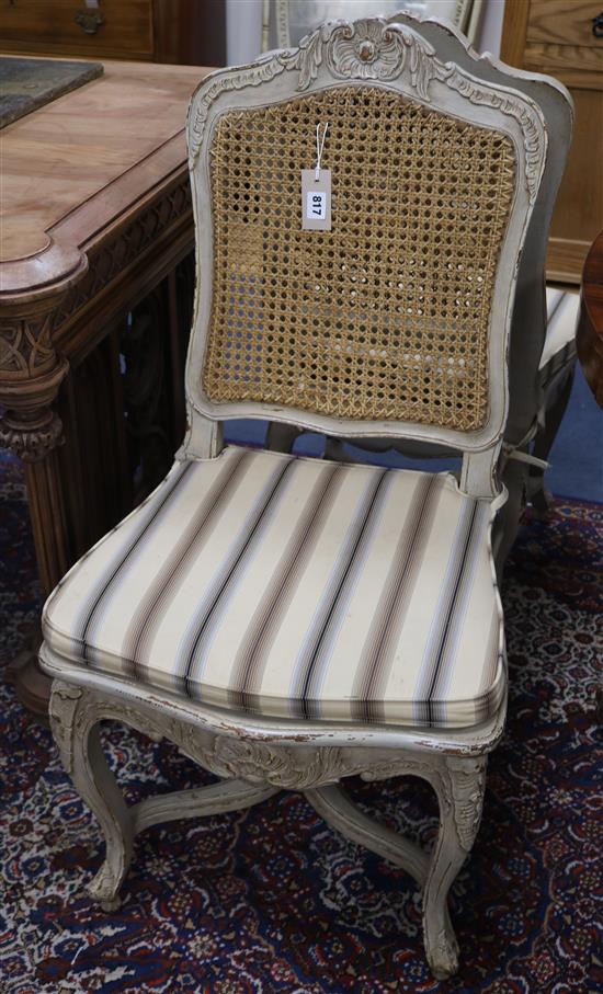 A set of four Louis XVI design caned chairs